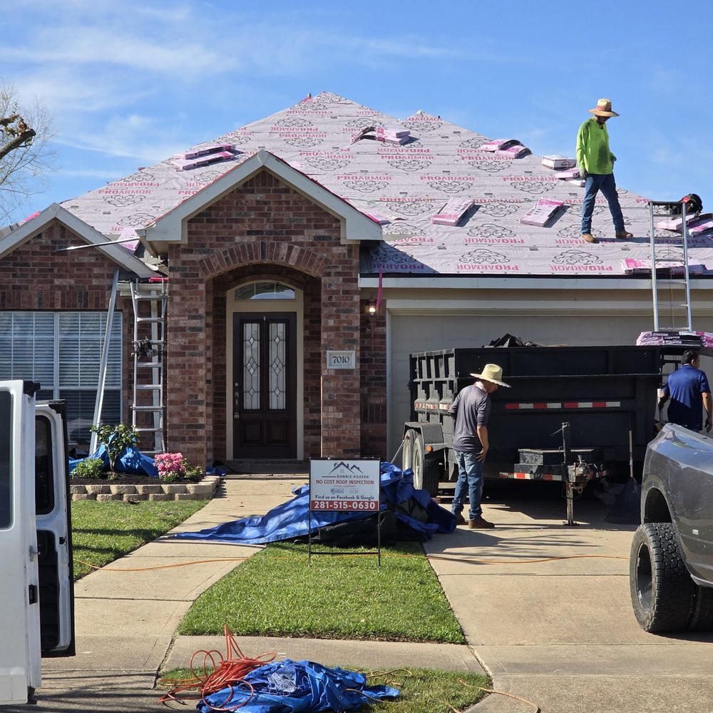 Ronnie Roofer crew replacing a roof on a Houston residential home